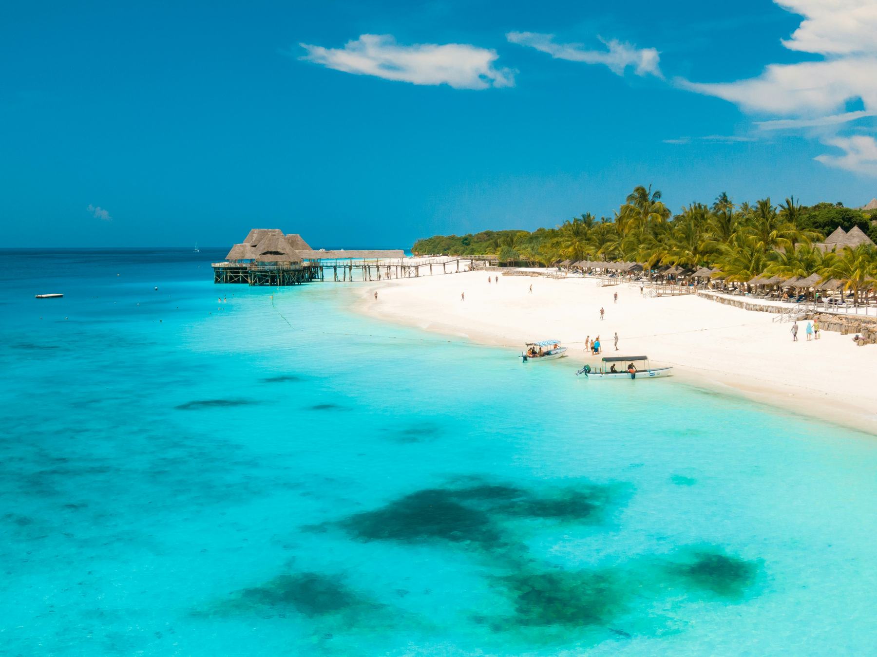 Turquoise water and a wooden jetty on the Zanzibar coast
